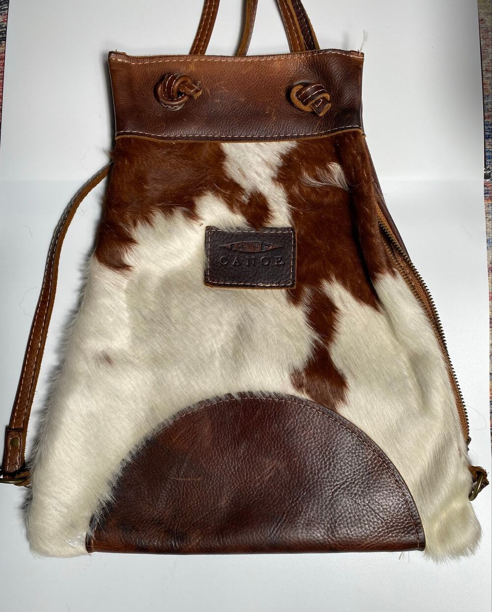 Canoe Brown & White Cow Hide Leather Backpack w/ Side Zippered Opening